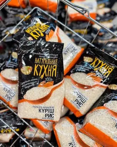 Пакеты риса для плова «Натуральная Кухня» в корзине магазина